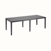 Mesa IPAE PROGARDEN em plástico, de cor cinzenta, com ranhuras e acabamento trançado e 6 pés de suporte. Sobre fundo branco.